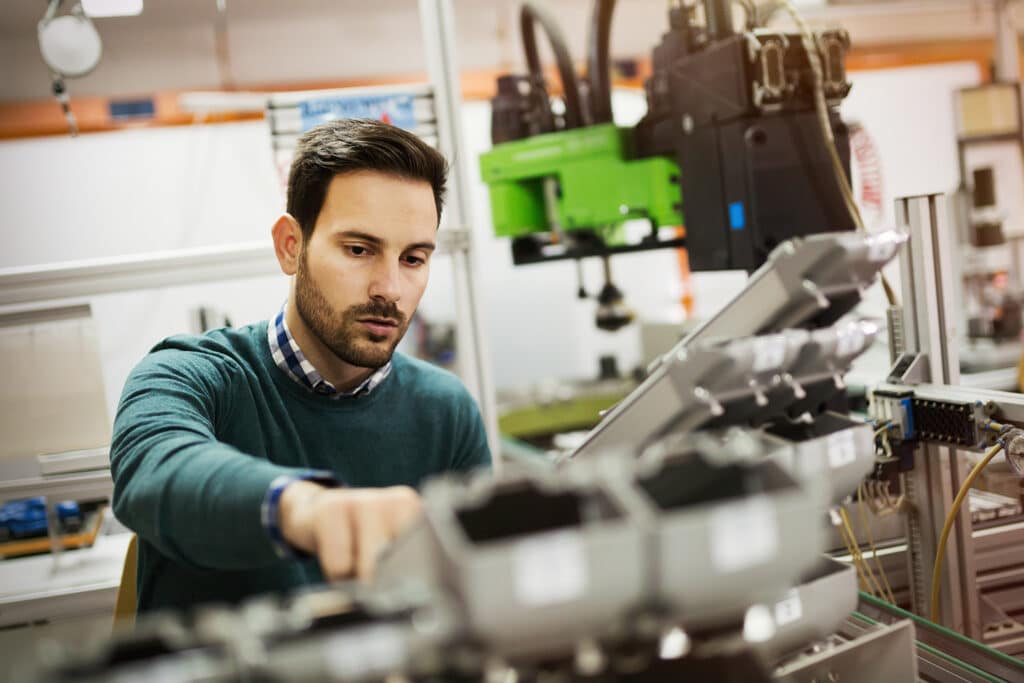 Creative mechanical engineer working on machines